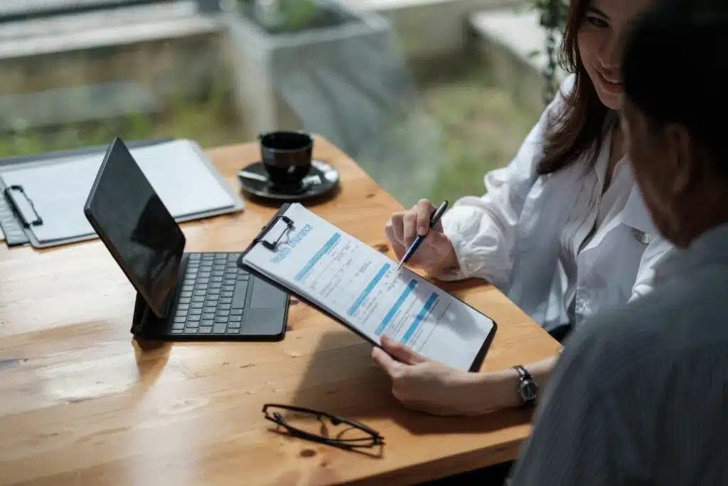 female-health-insurance-broker-presenting