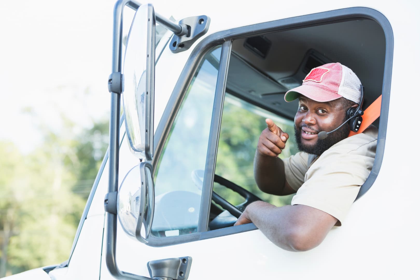 Light truck driver recommending VIM Cover for comprehensive light truck insurance coverage.
