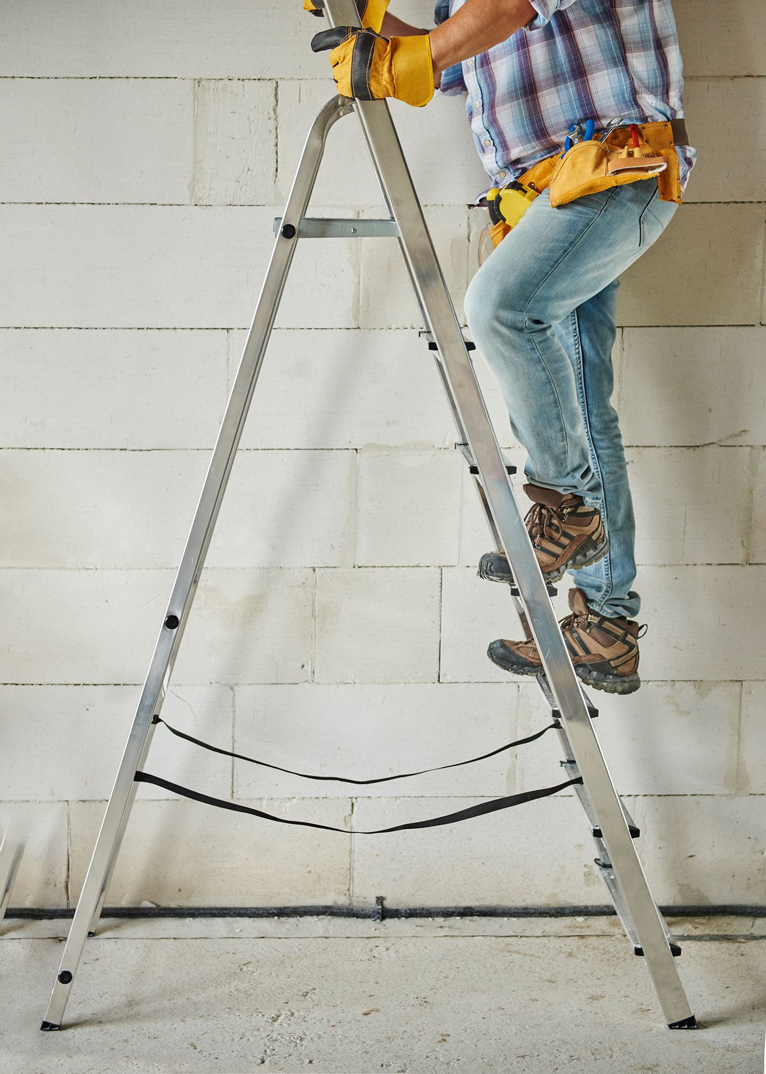 Man standing on ladder